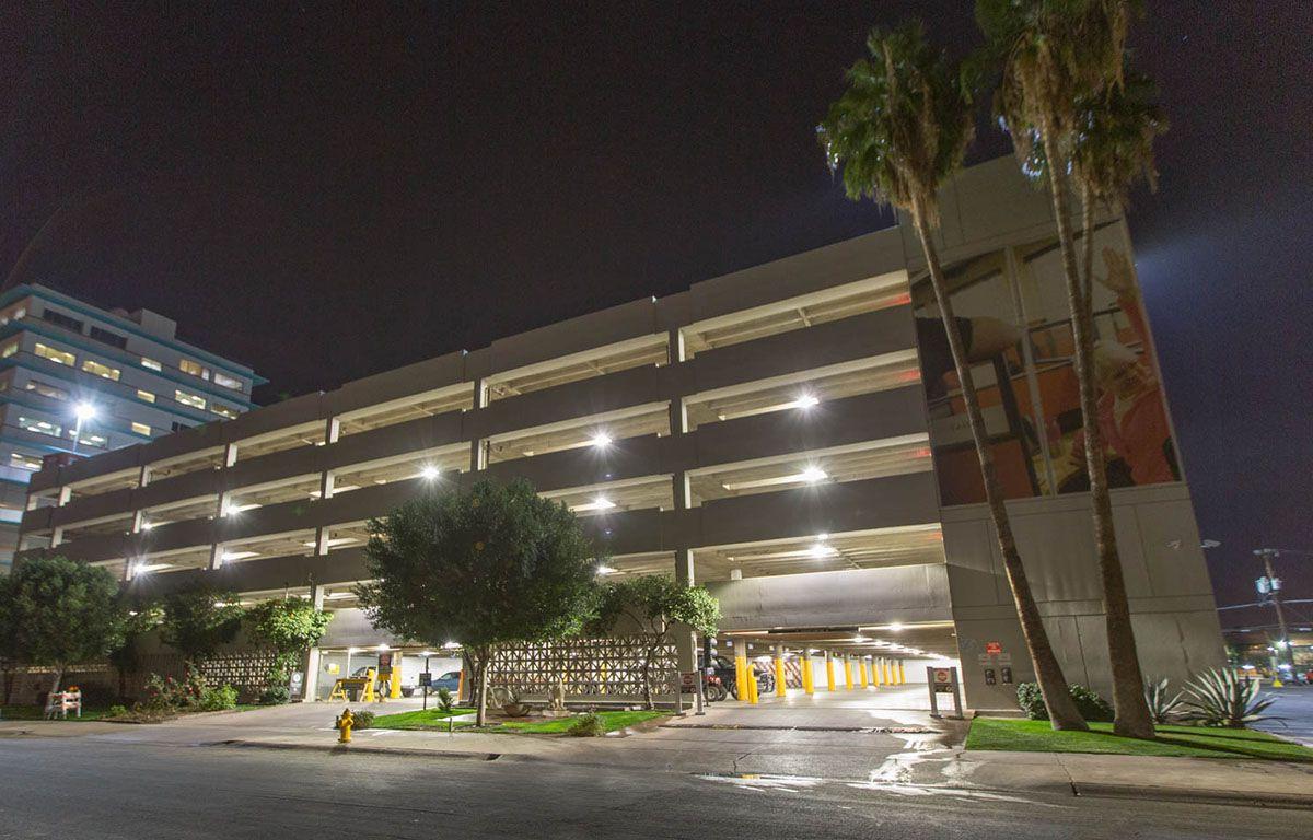 The U-Haul corporate office in Phoenix from the outside shown with bright parking garage lighting